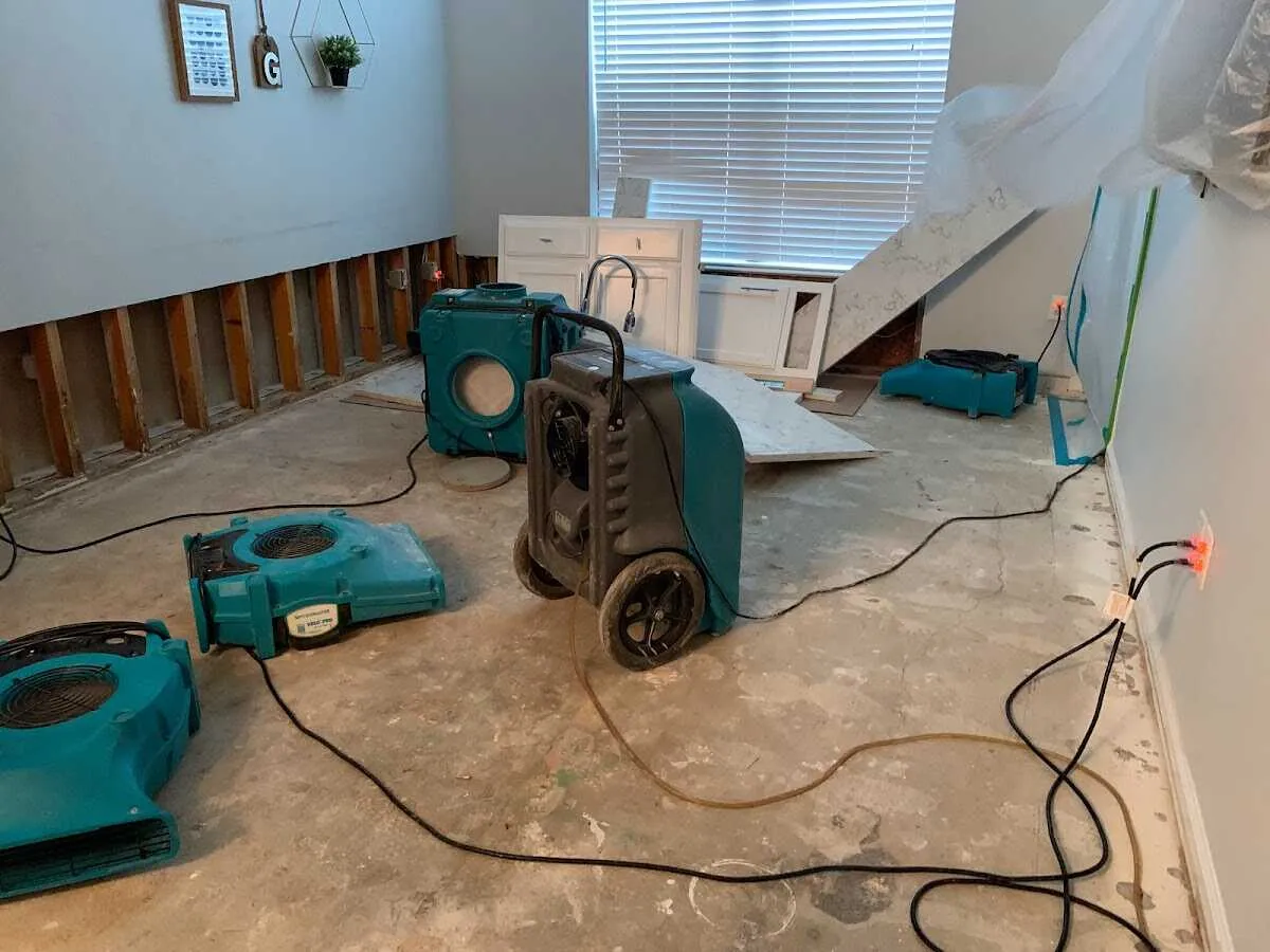 Dehumidifier in flood-cut room for Water Extraction & Removal in Caledonia
